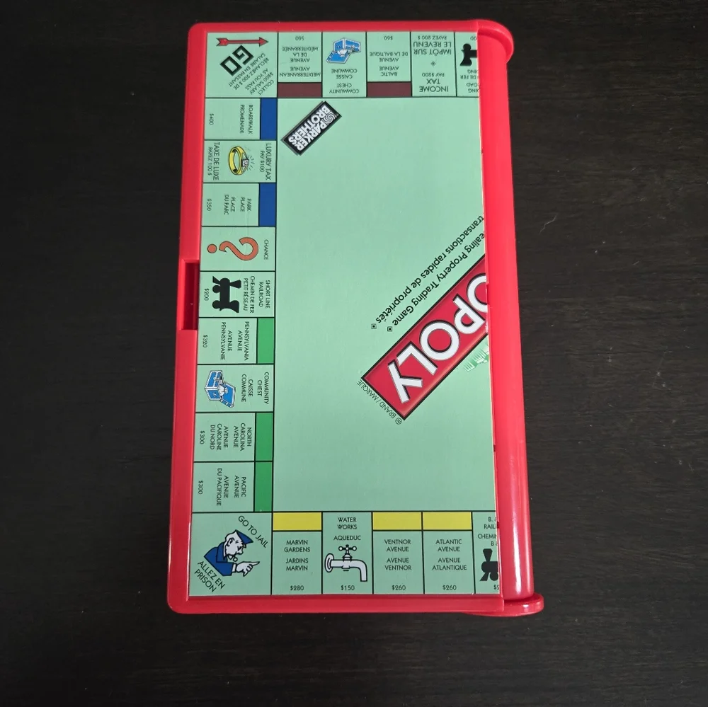 Travel Monopoly Game, Mini Game & Pieces English & Spanish Cards, Like New Cond